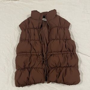 NA-KD chocolate puffer vest